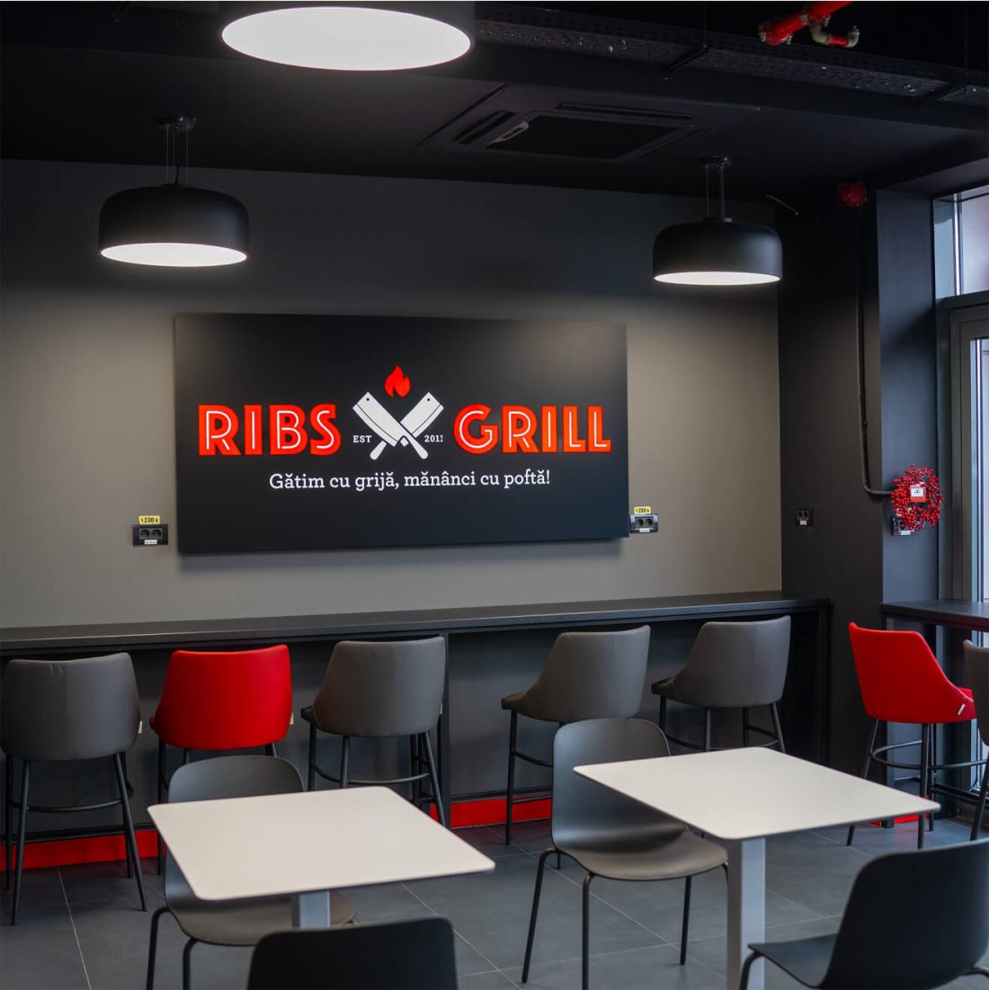 Restaurant interior with new brand identity elements.