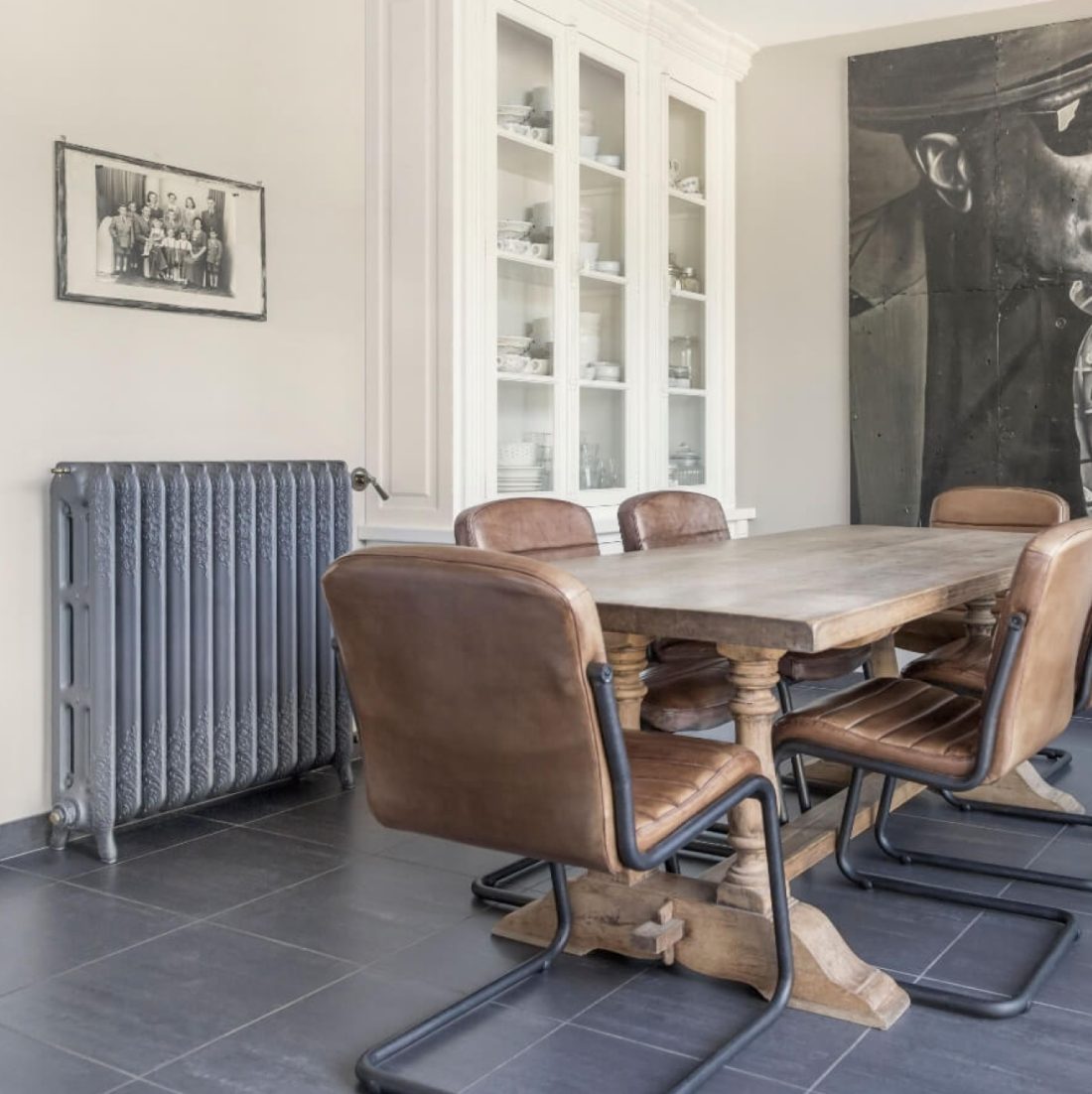 Lifestyle photo of vintage radiator in a home setting.