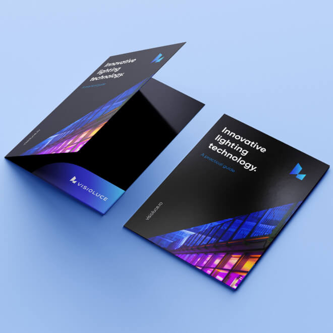 Branded stationery set for Visioluce including business cards and letterhead.