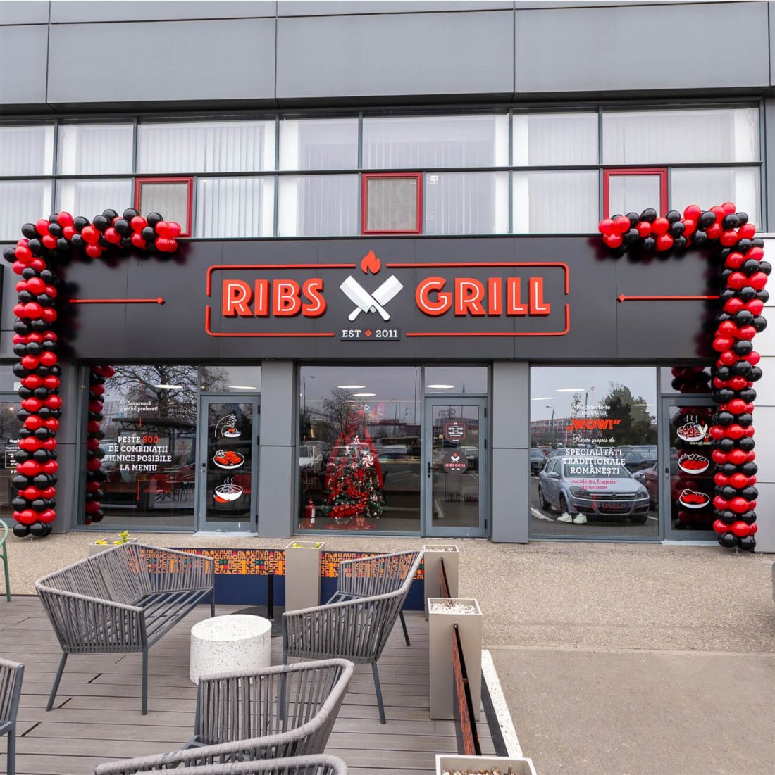 Outdoor signage design for Ribs Grill restaurants.